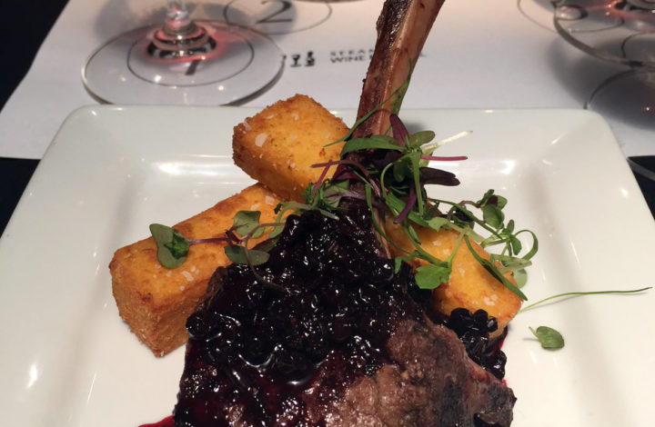 seared venison chop with crispy polenta sticks and huckleberry sauce