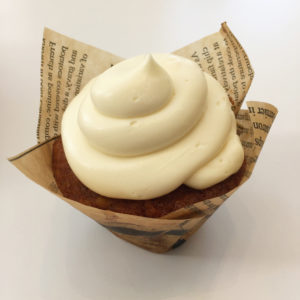 Carrot cake muffin with cream cheese frosting at Encore Bistro