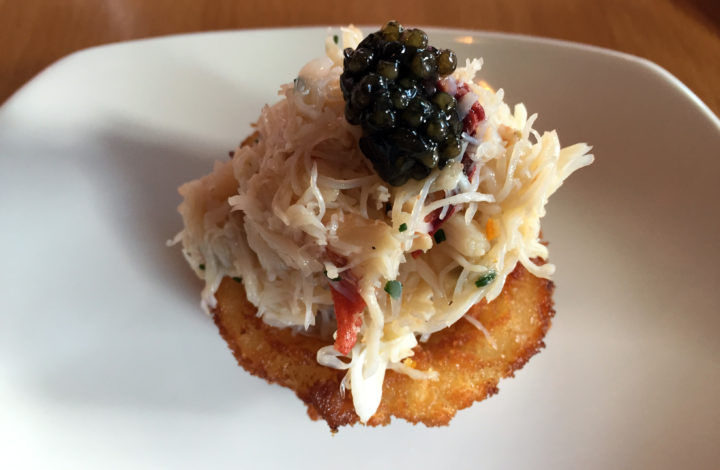 Dungeness crab on an onion ring