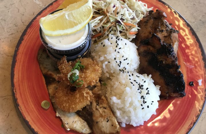 the Ohana plate—a grilled chicken breast marinated in a house-made teriyaki sauce served with fried shrimp and the fish of the day